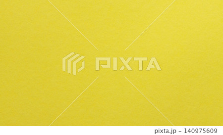 Solid bright yellow textured paper background with natural grain for design templates Solid bright yellow textured paper background with natural grain for design templates 140975609