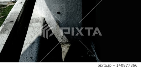 Minimalist Concrete Architecture Background with High Contrast Harsh Sunlight Shadows 140977866