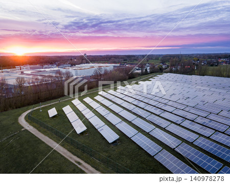 Aerial Solar Field at Dusk Powering Rural Community 140978278