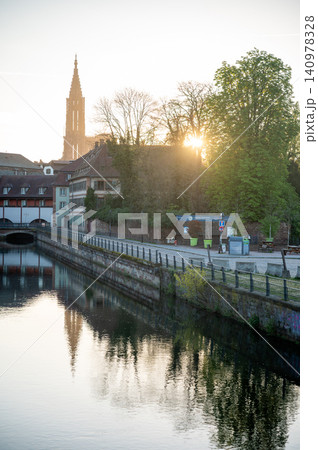 Church Spire Silhouetted Against Sunrise River Promenade Church Spire Silhouetted Against Sunrise River Promenade 140978328