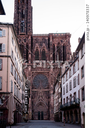 Towering Spire Rising Above Narrow Street Dramatic View Towering Spire Rising Above Narrow Street Dramatic View 140978337