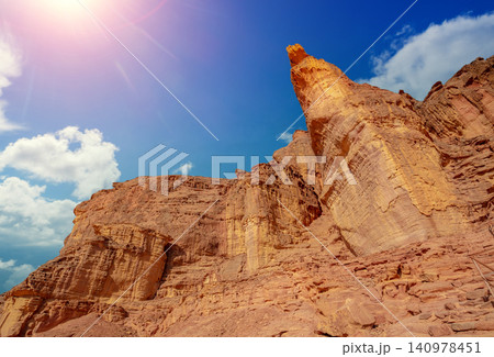 Timna valley. Sandstone cliffs in Timna park featuring King Solomon's Pillars Timna valley. Sandstone cliffs in Timna park featuring King Solomon's Pillars 140978451