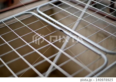Metal drying rack on apartment balcony Metal drying rack on apartment balcony 140978925