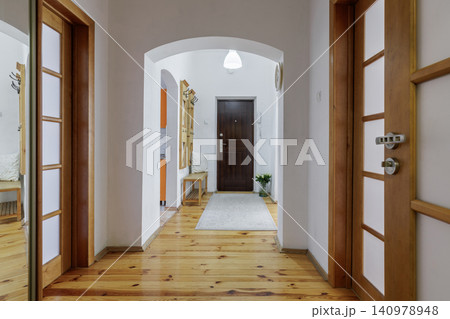 Apartment Corridor Interior with Wooden Doors and Arch Apartment Corridor Interior with Wooden Doors and Arch 140978948