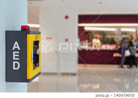 AED or Automated external defibrillator for first aid made available in public shopping center for emergency use AED or Automated external defibrillator for first aid made available in public shopping center for emergency use 140979050