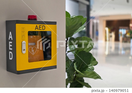 AED or Automated external defibrillator for first aid made available in public shopping center for emergency use AED or Automated external defibrillator for first aid made available in public shopping center for emergency use 140979051
