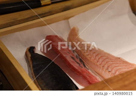 Fresh Sliced Raw Fish in Wooden Tray Fresh Sliced Raw Fish in Wooden Tray 140980015