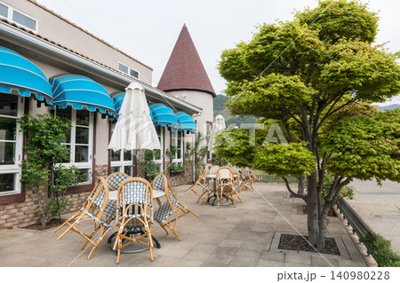 restaurant building with outdoor patio in garden, Kawaguchiko lake 140980228
