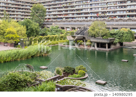 The Barbican Estate residential buildings and lake in London The Barbican Estate residential buildings and lake in London 140980295