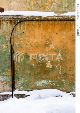 orange and green painted wall of factory building orange and green painted wall of factory building 140984274