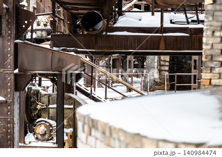 snow-covered territory of abandoned factory snow-covered territory of abandoned factory 140984474
