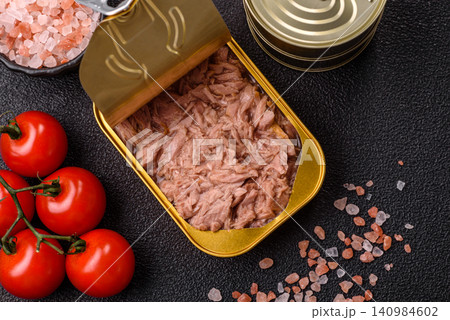 Fish, canned tuna chunks in brine for sandwiches and salads. Canned tuna 140984602