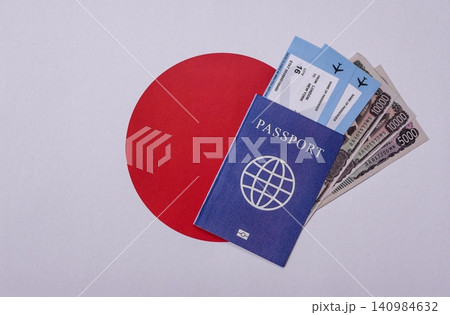 Japanese passport or id document with tickets for flight, travel, border crossing. Japan passport Japanese passport or id document with tickets for flight, travel, border crossing. Japan passport 140984632