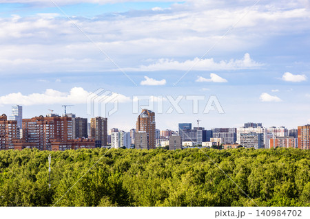 skyline with apartment houses and green city park skyline with apartment houses and green city park 140984702