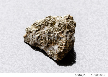 rough pyrite, chalcopyrite on quartz on granite rough pyrite, chalcopyrite on quartz on granite 140984867