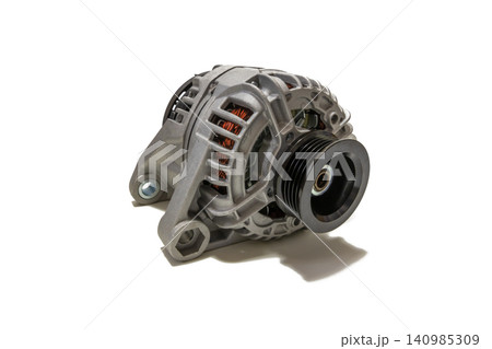 Front view of a car alternator isolated on white background. Automotive electrical charging system component for vehicle repair, maintenance, replacement, and engineering concepts. Front view of a car alternator isolated on white background. Automotive electrical charging system component for vehicle repair, maintenance, replacement, and engineering concepts. 140985309