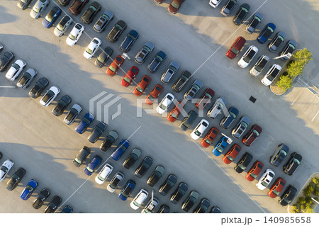 Large parking lot of local dealer with many brand new cars parked for sale. Development of american automotive industry and distribution of manufactured vehicles concept Large parking lot of local dealer with many brand new cars parked for sale. Development of american automotive industry and distribution of manufactured vehicles concept 140985658