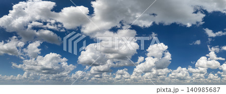 Rain clouds forming on blue Florida sky. Colorful summer skyscape 140985687