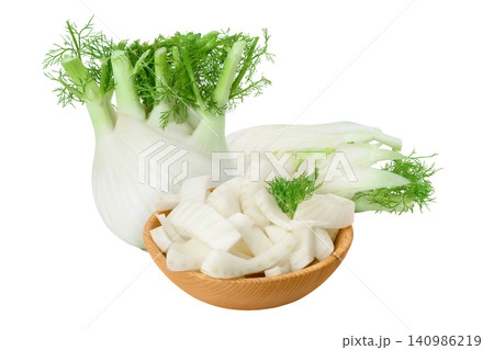 fresh fennel bulb slices in wooden bowl isolated on white background with full depth of field fresh fennel bulb slices in wooden bowl isolated on white background with full depth of field 140986219