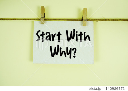 Start With Why paper notes hanging on the rope with clothespins Start With Why paper notes hanging on the rope with clothespins 140986571