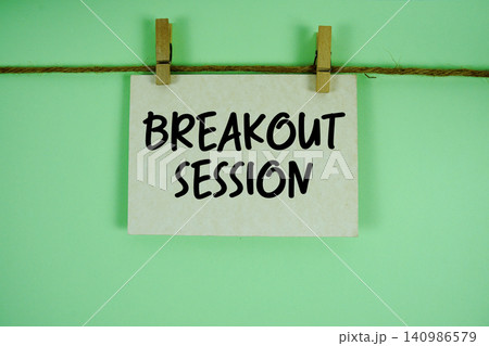 Breakout Session paper notes hanging on the rope with clothespins Breakout Session paper notes hanging on the rope with clothespins 140986579