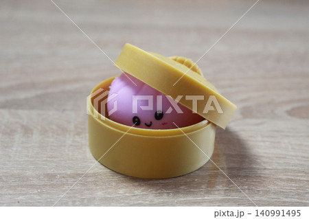 Pink Anti-Stress Squash squishy Dumpling Lying In Yellow Case Pink Anti-Stress Squash squishy Dumpling Lying In Yellow Case 140991495