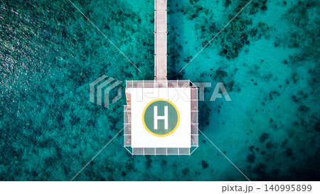 Aerial view of helipad over the sea Aerial view of helipad over the sea 140995899
