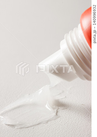 Closeup Lip Balm Smear from Squeeze Tube Closeup Lip Balm Smear from Squeeze Tube 140996932