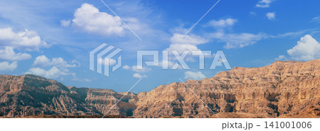 View of the desert on a bright sunny day. Timna Park in Arava desert near Eilat, Israel View of the desert on a bright sunny day. Timna Park in Arava desert near Eilat, Israel 141001006