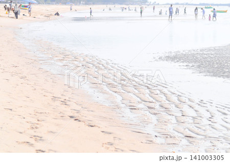 man on the beach or beach ,sand and sea or beach background or sea background man on the beach or beach ,sand and sea or beach background or sea background 141003305