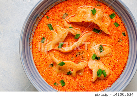 Coconut creamy dumpling soup or curry dumpling soup. Coconut creamy dumpling soup or curry dumpling soup. 141003634