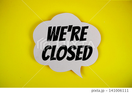 We're Closed text with speech bubble on yellow background 141006111