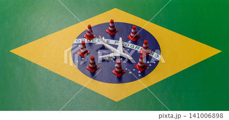 A mock up of airplane surrounded by no fly signs on a brazil flag as a concept A mock up of airplane surrounded by no fly signs on a brazil flag as a concept 141006898
