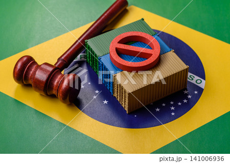 The cargo container ban on the brazil flag as a conceptual backdrop. Cargo container embargo The cargo container ban on the brazil flag as a conceptual backdrop. Cargo container embargo 141006936