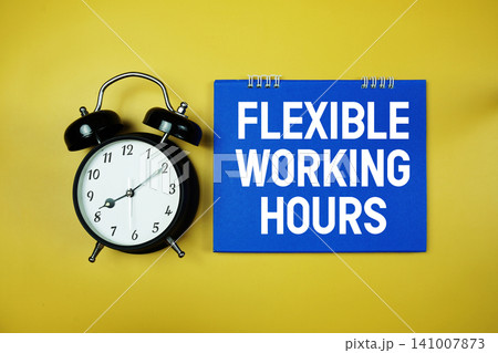 Flexible Working Hours text with alarm clock on yellow background Flexible Working Hours text with alarm clock on yellow background 141007873