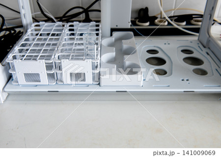 Laboratory sample preparation with test tubes, beaker in analytical laboratory Laboratory sample preparation with test tubes, beaker in analytical laboratory 141009069