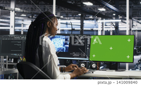 IT colleagues collaborate in a data center while reviewing AI diagnostics and infrastructure performance. IT colleagues collaborate in a data center while reviewing AI diagnostics and infrastructure performance. 141009840