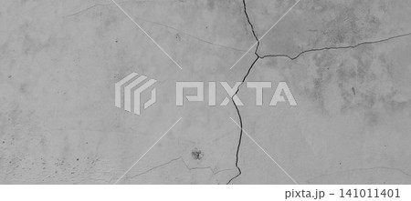 Cracked concrete wall with a minimalist gray cement texture. 141011401