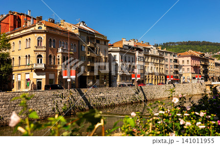 Summer embankment along Miljacka River in Sarajevo, Bosnia and Herzegovina 141011955