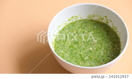 Thai spicy seafood dipping sauce on white bowl 141012937