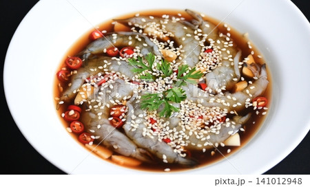 shrimp in soy sauce on white plate, korean style menu shrimp in soy sauce on white plate, korean style menu 141012948