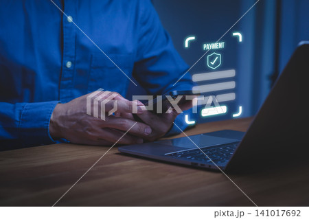 Man using smartphone for secure online digital payment. Mobile banking technology concept for business finance and internet transaction. 141017692