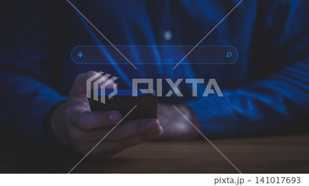 Man using smartphone for online search. Digital business technology concept for networking, mobile internet, and finding information. 141017693