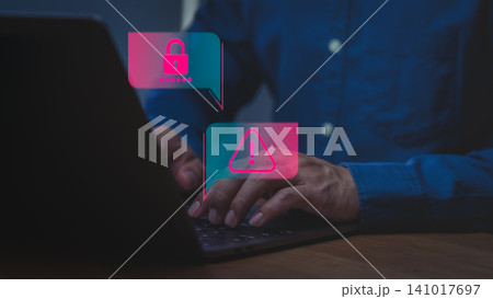 Male user using laptop for cyber attack. Cybersecurity alert with password warning icon. Technology concept for internet security and data protection. Male user using laptop for cyber attack. Cybersecurity alert with password warning icon. Technology concept for internet security and data protection. 141017697