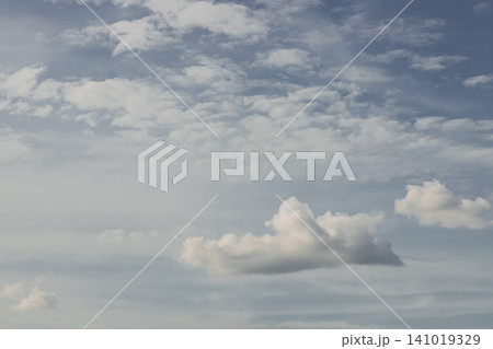 Cloud sky white cloud blue sky cloudscape weather atmosphere daylight nature calm airy sky with white cloud and soft blue horizon peaceful weather scene 141019329