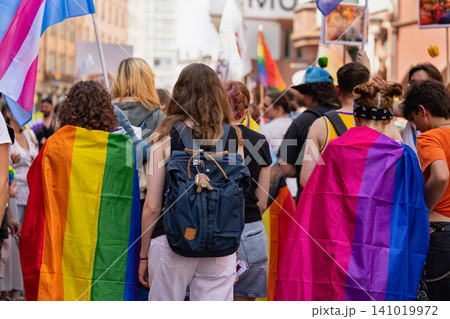 Participants wearing rainbow pride flags demonstration Participants wearing rainbow pride flags demonstration 141019972