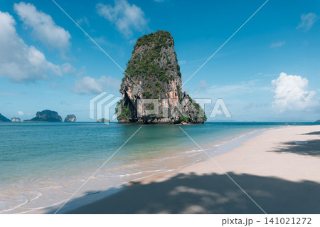 Iconic Limestone Karst Rock Formation in the Sea at a Tropical Beach in Krabi Iconic Limestone Karst Rock Formation in the Sea at a Tropical Beach in Krabi 141021272