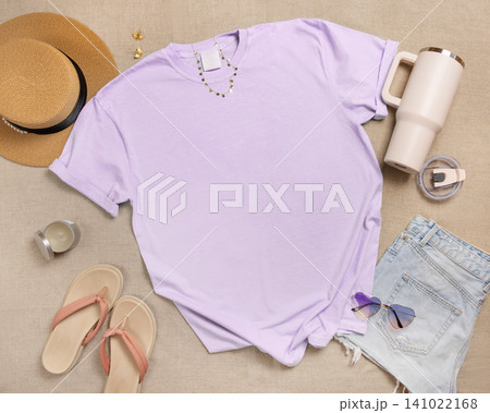 Blank light purple shirt mockup with summer accessories, template for print on demand, copy space Blank light purple shirt mockup with summer accessories, template for print on demand, copy space 141022168