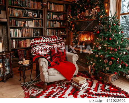 Cozy reading corner with red chairs and Christmas tree in a rustic library during winter 141022601