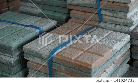 Bundled square concrete paving blocks with surface patterns Bundled square concrete paving blocks with surface patterns 141024735
